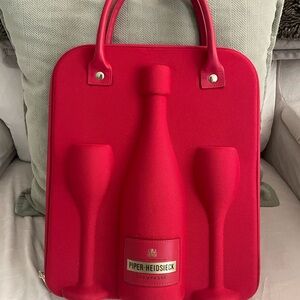 Piper Heidsieck bottle carrier with glasses.
